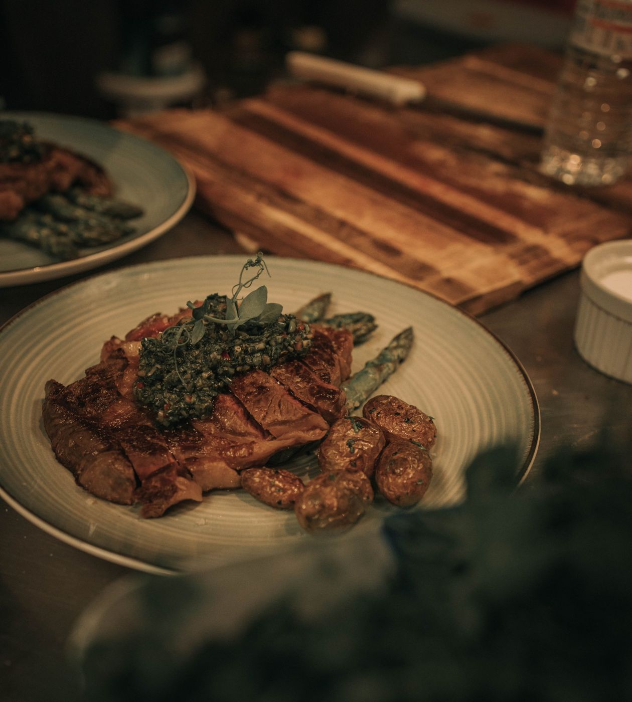 Dry-aged entrecôte with chimichurri, grilled asparagus and baby potatoes